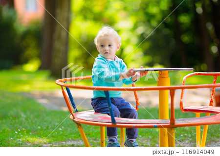 Kids explore nature. Children play in sunny park. Kids explore nature. Children play in sunny park. 116914049
