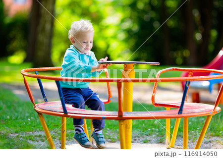 Kids explore nature. Children play in sunny park. Kids explore nature. Children play in sunny park. 116914050