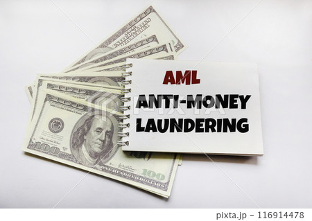 Business concept. On the notepad there is the inscription - Anti-Money Laundering,  116914478