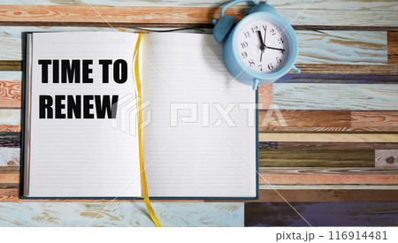 Time to Renew, text on a notepad, next to the alarm clock. Business concepts, strategy, plans Time to Renew, text on a notepad, next to the alarm clock. Business concepts, strategy, plans 116914481