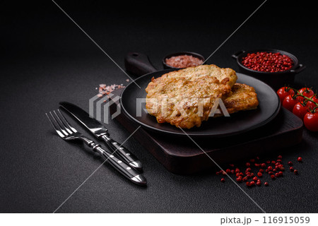 Delicious fried pork or chicken chops breaded with salt and spices 116915059