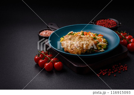 Delicious boiled rice with vegetables or risotto with carrots, peas and corn 116915093