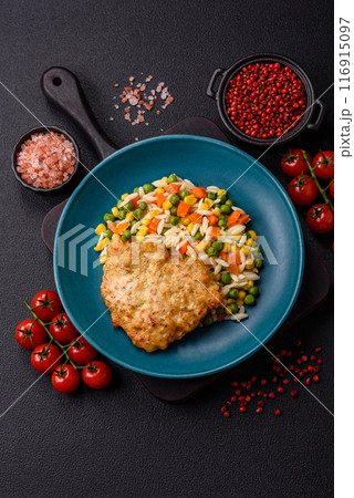 Delicious boiled rice with vegetables or risotto with carrots, peas and corn 116915097
