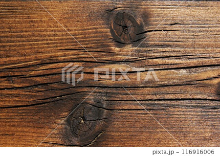 Wooden board structure. Old brown cracked board. Wooden board structure. Old brown cracked board. 116916006