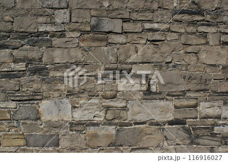 Decorative wall made of natural stones. 116916027