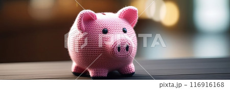 Crocheted pink piggy bank on wooden surface,...のイラスト素材 [116916168] - PIXTA