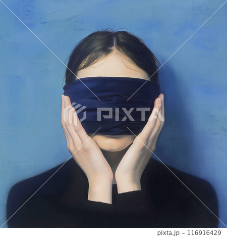 Woman holding a black blindfold over her eyes and mouth against a blue background 116916429