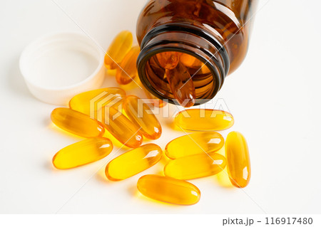 Fish oil Omega 3 capsules vitamin with EPA and DHA isolated on white background. Fish oil Omega 3 capsules vitamin with EPA and DHA isolated on white background. 116917480