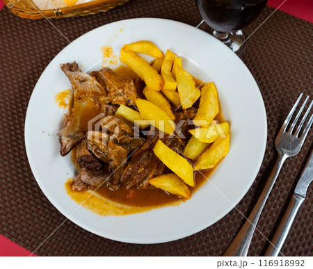 Juicy pork stew in soy sauce with fried potato slices Juicy pork stew in soy sauce with fried potato slices 116918992