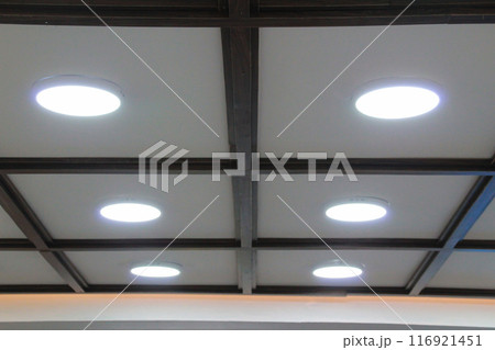 Round led lights on white ceiling 116921451