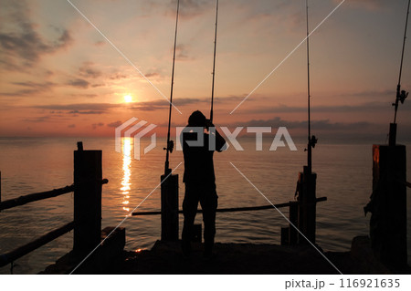 sunrise on the beach pier bridge with a clear sky 116921635