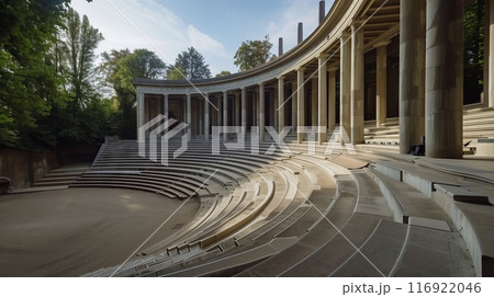 An open-air classical amphitheater with grand columns and an empty stage awaits a live orchestra. An open-air classical amphitheater with grand columns and an empty stage awaits a live orchestra. 116922046