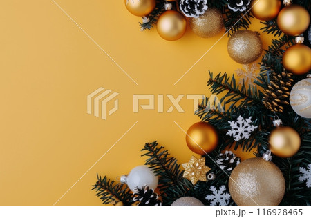 Pine Branches and Ornaments on Yellow Background Pine Branches and Ornaments on Yellow Background 116928465