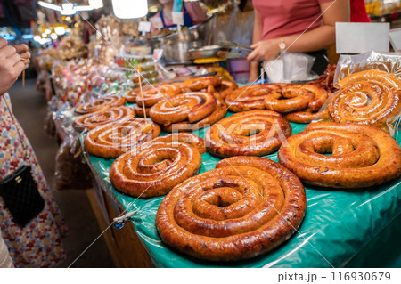 Sai Aua, Northern Thailand Spicy Sausage is a famous Traditional Local saurage cooked with curry and herb, lay on shop and ready for sales. 116930679