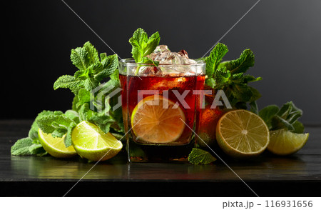 Iced drink with lime and mint. Iced drink with lime and mint. 116931656