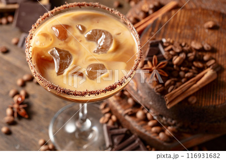 Cream and coffee cocktail with ice. 116931682