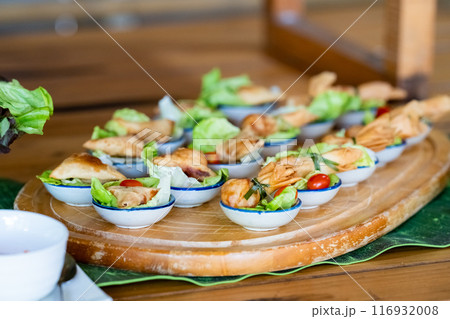 Thung thong is Thai fried bag dumplings made from pork and vegetables that are wrapped in dumplings and deep fried. Thung thong is Thai fried bag dumplings made from pork and vegetables that are wrapped in dumplings and deep fried. 116932008