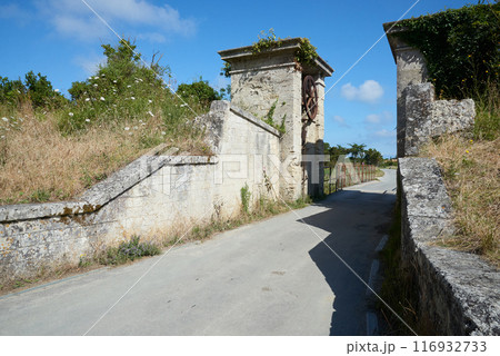 The entrance door and wheel of the Fortress at  Aix island in atlantic ocean 116932733