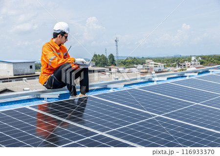 Professional Engineer Service Solar Panel. Worker Maintenance Cleaning Replacing Solar Panel. Solar photovoltaic panel system in Industry roof. Saving Energy with Clean Power. Professional Engineer Service Solar Panel. Worker Maintenance Cleaning Replacing Solar Panel. Solar photovoltaic panel system in Industry roof. Saving Energy with Clean Power. 116933370