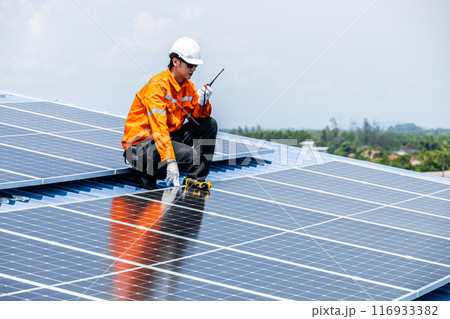 Professional Engineer Service Solar Panel. Worker Maintenance Cleaning Replacing Solar Panel. Solar photovoltaic panel system in Industry roof. Saving Energy with Clean Power. Professional Engineer Service Solar Panel. Worker Maintenance Cleaning Replacing Solar Panel. Solar photovoltaic panel system in Industry roof. Saving Energy with Clean Power. 116933382