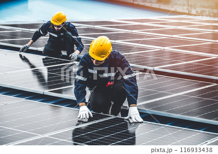 Professional Engineer Service Solar Panel. Worker Maintenance Cleaning Replacing Solar Panel. Solar photovoltaic panel system in Industry roof. Saving Energy with Clean Power. 116933438