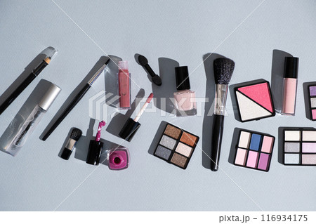 Makeup on Blue Background, Top View 116934175