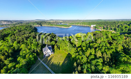 An aerial view of the Schwarzenberg Vault, a small chapel with a steeple, overlooking the Vltava River. In the background is the Orlik Castle An aerial view of the Schwarzenberg Vault, a small chapel with a steeple, overlooking the Vltava River. In the background is the Orlik Castle 116935189