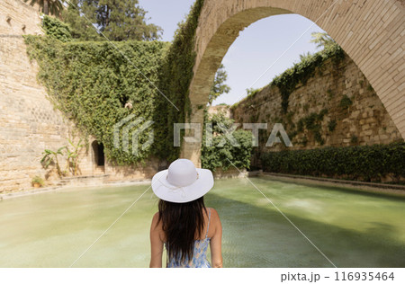 Young girl walking on the street in capital town of Mallorca Palma de Mallorca 116935464