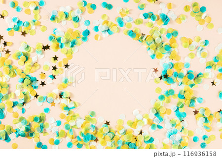 Happy birthday or any holiday festive background with confetti and copy space Happy birthday or any holiday festive background with confetti and copy space 116936158