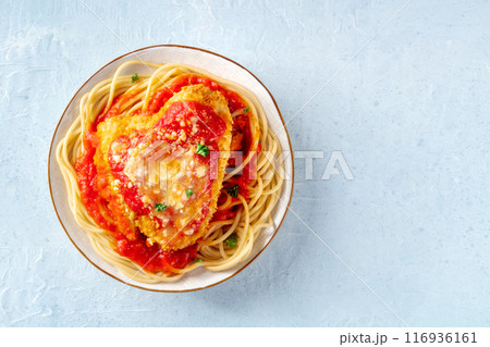 Chicken Parmesan, Italian pasta dish. Breaded chicken breast with cheese 116936161