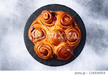 Homemade cake pie roll with cherry . Food background 116936958