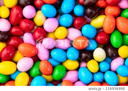 Mix of colorful candies . Multicolored unhealthy background. Sweet dessert Mix of colorful candies . Multicolored unhealthy background. Sweet dessert 116936998