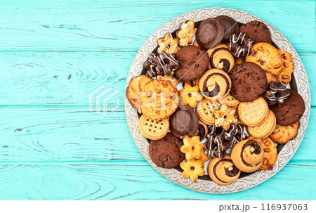 Mix of cookies . Many unhealthy snacks . Top view Mix of cookies . Many unhealthy snacks . Top view 116937063