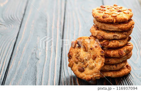 Mix of cookies chocolate and peanut . Many unhealthy snacks . Mix of cookies chocolate and peanut . Many unhealthy snacks . 116937094