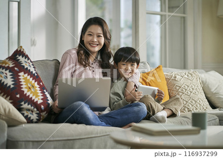home portrait of young asian mother and five-year-old son home portrait of young asian mother and five-year-old son 116937299