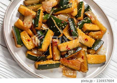 Japanese Hibachi Zucchini on a plate, top view Japanese Hibachi Zucchini on a plate, top view 116937604