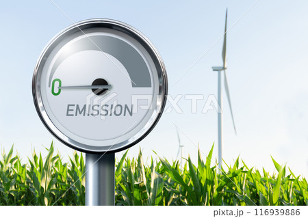 Gauge with inscription EMISSION on a background of renewable energy sources. Arrow points to zero. Concept of green energy Gauge with inscription EMISSION on a background of renewable energy sources. Arrow points to zero. Concept of green energy 116939886