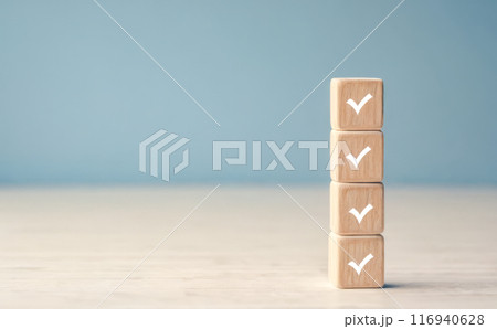 four wooden cubes marked tick check completed tasks. concept of organization, sequential task execution, and productivity. project management, goal achievement, and business efficiency visuals four wooden cubes marked tick check completed tasks. concept of organization, sequential task execution, and productivity. project management, goal achievement, and business efficiency visuals 116940628
