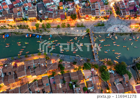 Aerial drone view of Hoi An city, Vietnam. Ancient town, UNESCO world heritage, at Quang Nam province. 116941278