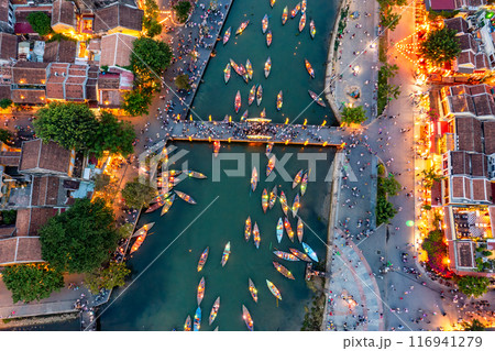 Aerial drone view of Hoi An city, Vietnam. Ancient town, UNESCO world heritage, at Quang Nam province. Aerial drone view of Hoi An city, Vietnam. Ancient town, UNESCO world heritage, at Quang Nam province. 116941279