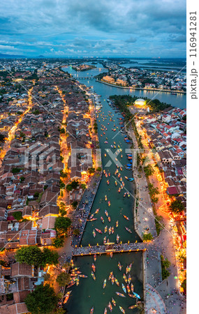 Aerial drone view of Hoi An city, Vietnam. Ancient town, UNESCO world heritage, at Quang Nam province. Aerial drone view of Hoi An city, Vietnam. Ancient town, UNESCO world heritage, at Quang Nam province. 116941281