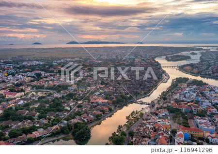 Aerial drone view of Hoi An city, Vietnam. Ancient town, UNESCO world heritage, at Quang Nam province. Aerial drone view of Hoi An city, Vietnam. Ancient town, UNESCO world heritage, at Quang Nam province. 116941296