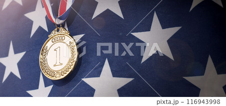 Gold silver and bronze mockup trophy medals with ribbon against United States of America flag. Represent winner of national or international olympic sport competition. Award winner and victory concept 116943998