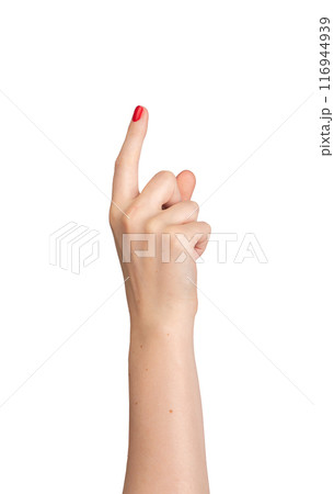 Female hand pointing, index finger extended and varnished in red, signaling direction. Right hand 116944939
