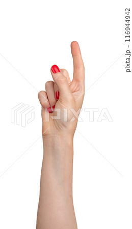 Female hand pointing, index finger extended and varnished in red, signaling direction. Right hand Female hand pointing, index finger extended and varnished in red, signaling direction. Right hand 116944942