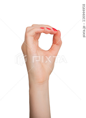 Hand showing the sign for zero, with thumb and forefinger forming an O. Isolated on white background 116944958