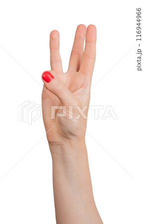 A hand showing the number three with three fingers (index, middle, and ring) raised, isolated A hand showing the number three with three fingers (index, middle, and ring) raised, isolated 116944966