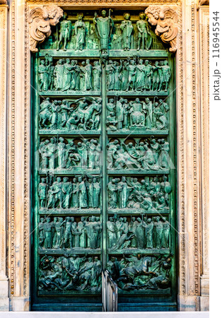 Ornate Milan Cathedral door 116945544