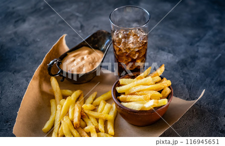 French fries with sauce and drink 116945651