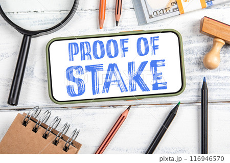 Proof Of Stake. Mobile phone, money and stationery on the office table Proof Of Stake. Mobile phone, money and stationery on the office table 116946570